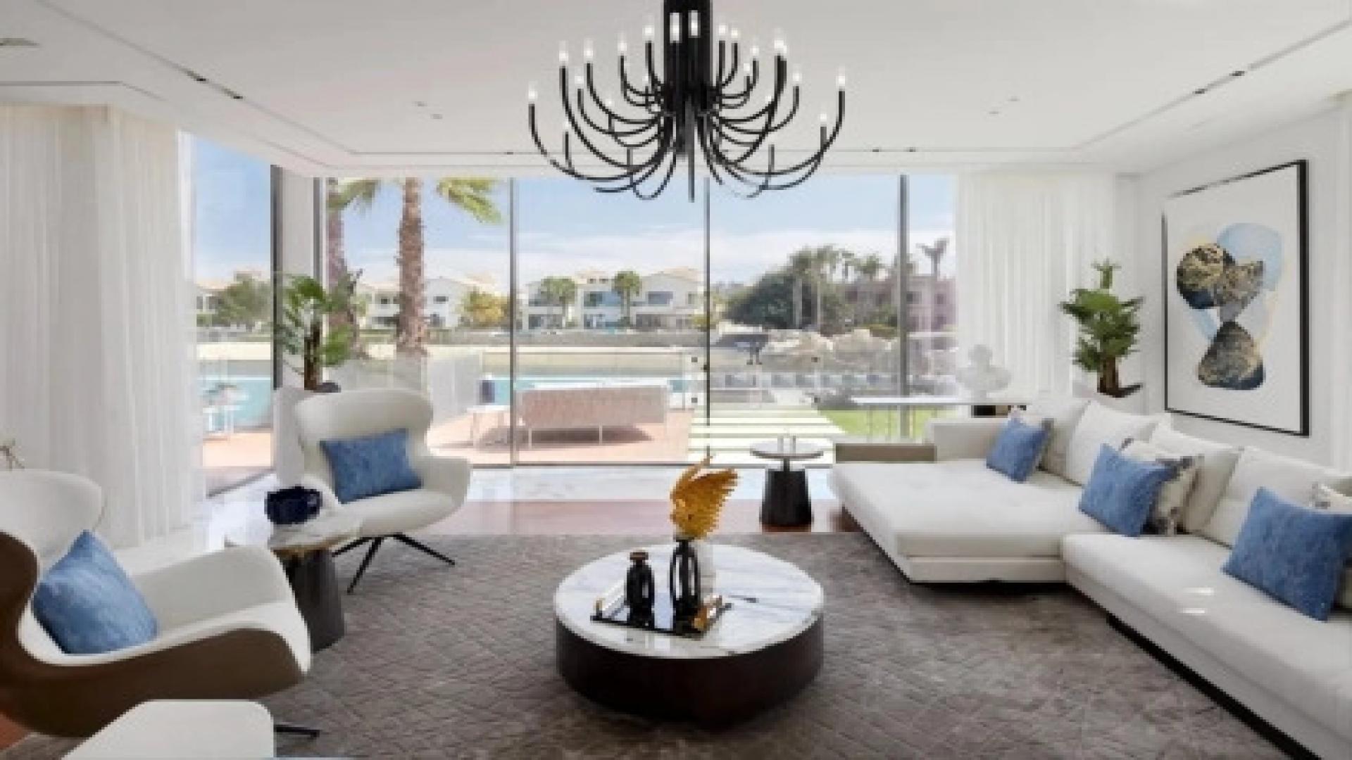 Luxurious dining area in Palm Jumeirah villa, spacious with modern design and waterfront view