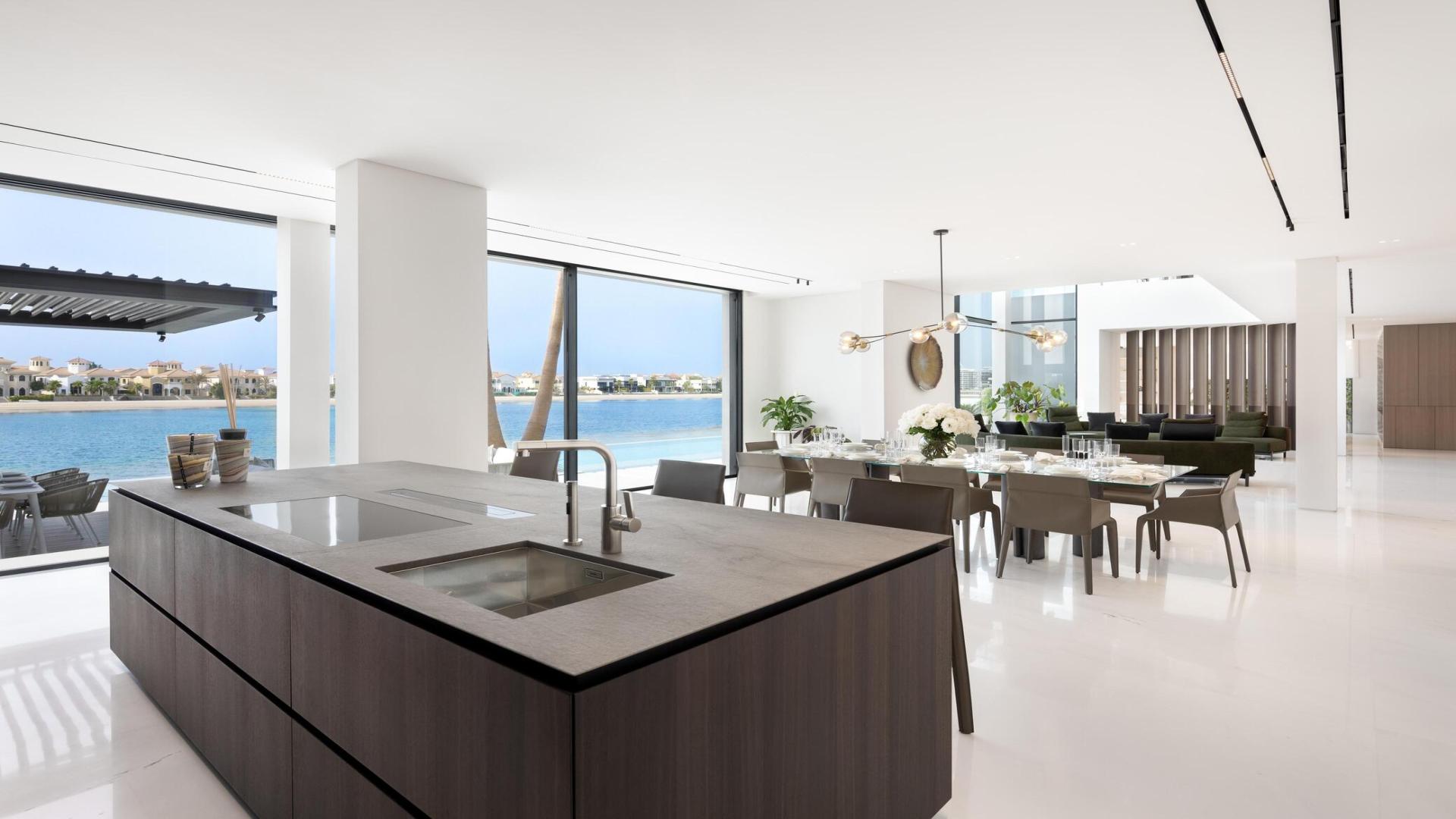 Luxurious living room in Palm Jumeirah villa with sea view, modern design, spacious layout