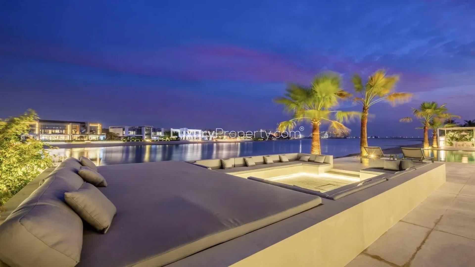 Luxurious Palm Jumeirah villa with pool, spacious patio, elegant architecture, for sale