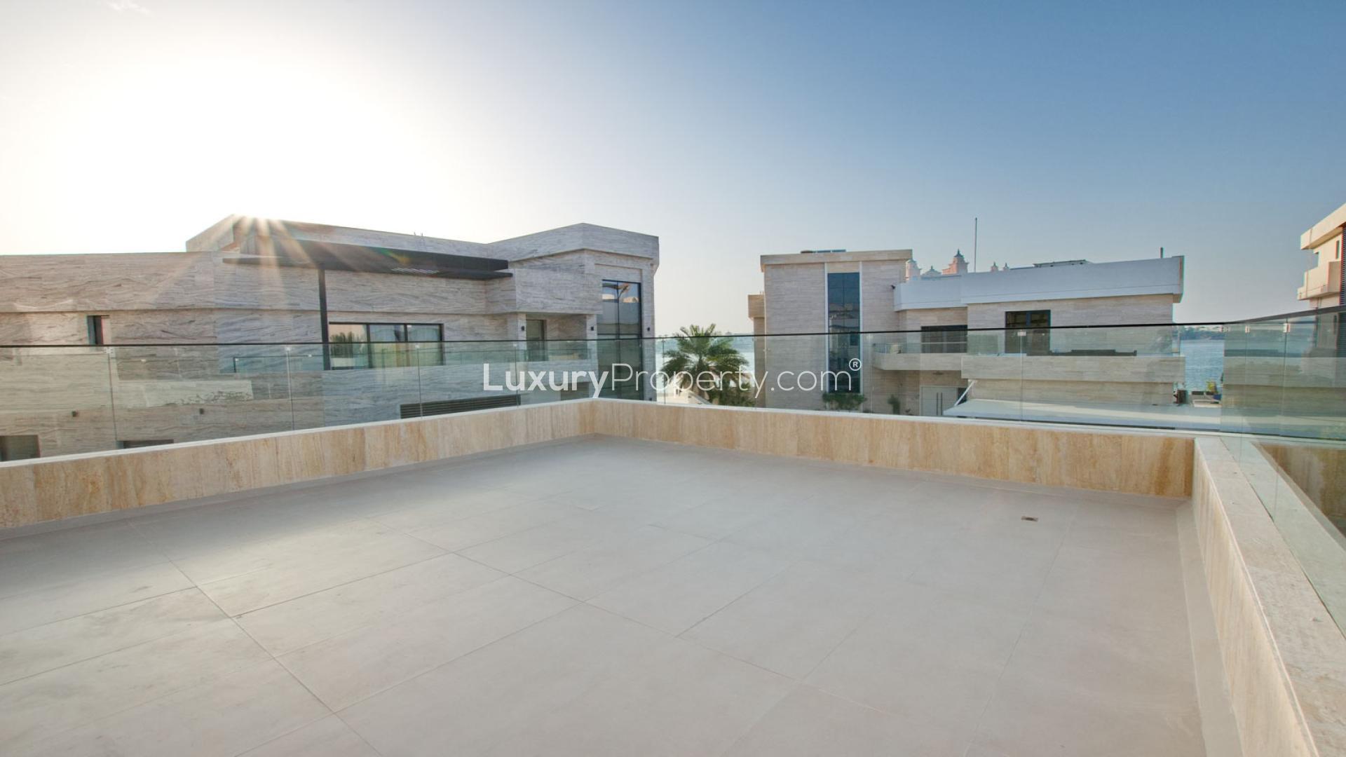 Beachfront view from luxury 6-bedroom villa with pool in Palm Jumeirah's Signature Villas