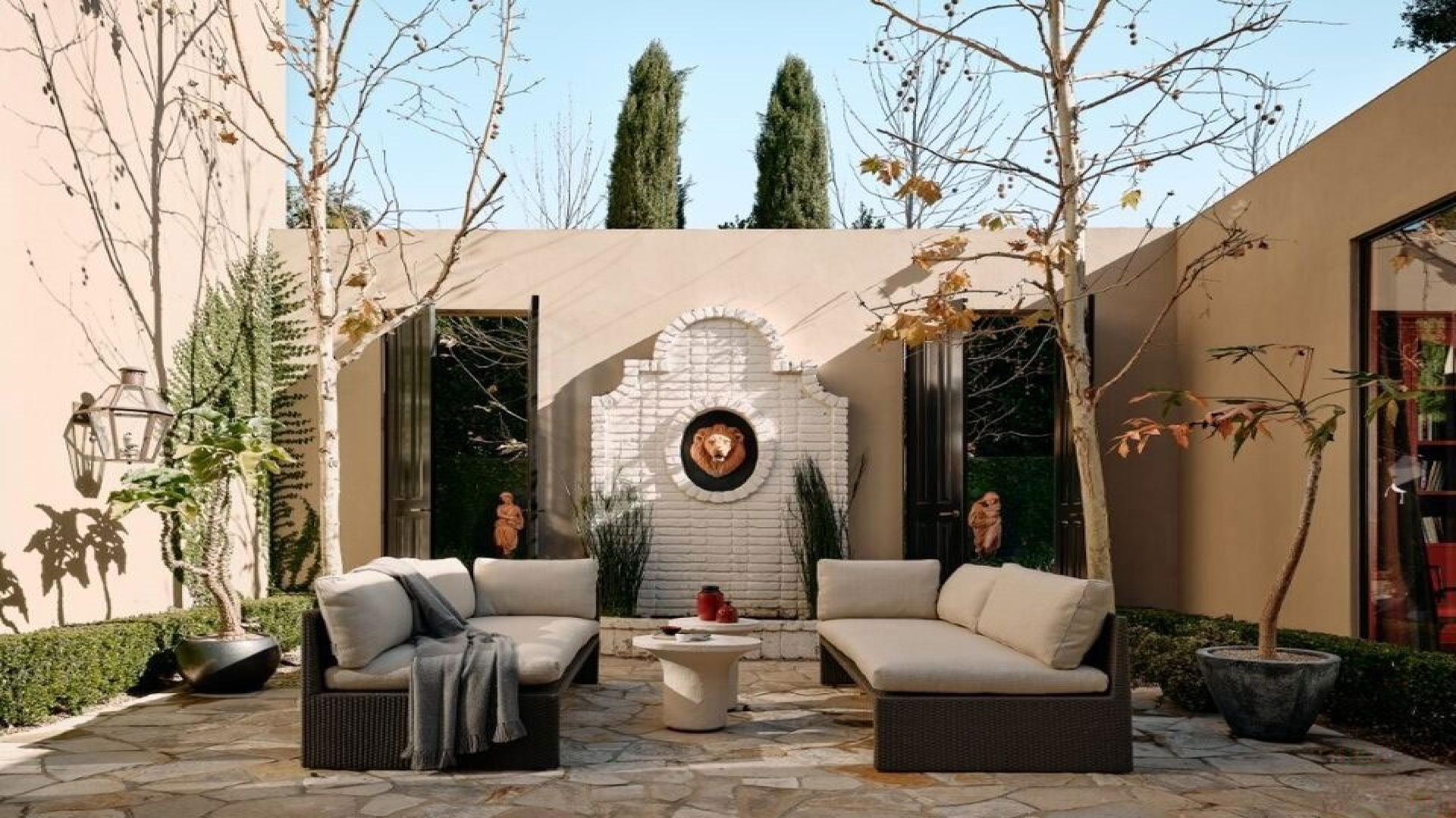 Luxurious Hollywood Regency villa interior with elegant staircase in Bel Air, Los Angeles