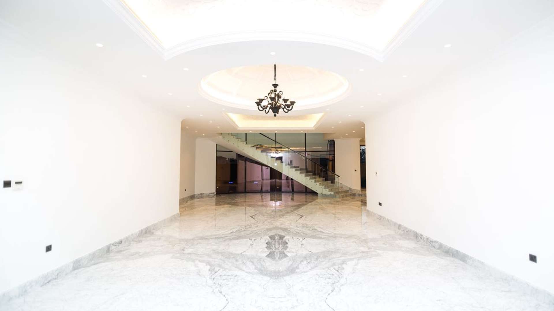 Luxurious 6-bedroom villa exterior in Al Sufouh, Dubai, with elegant nighttime lighting