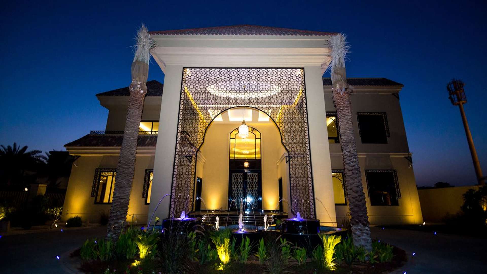 Luxurious 6-bedroom villa exterior at night, Al Sufouh, Dubai, for sale