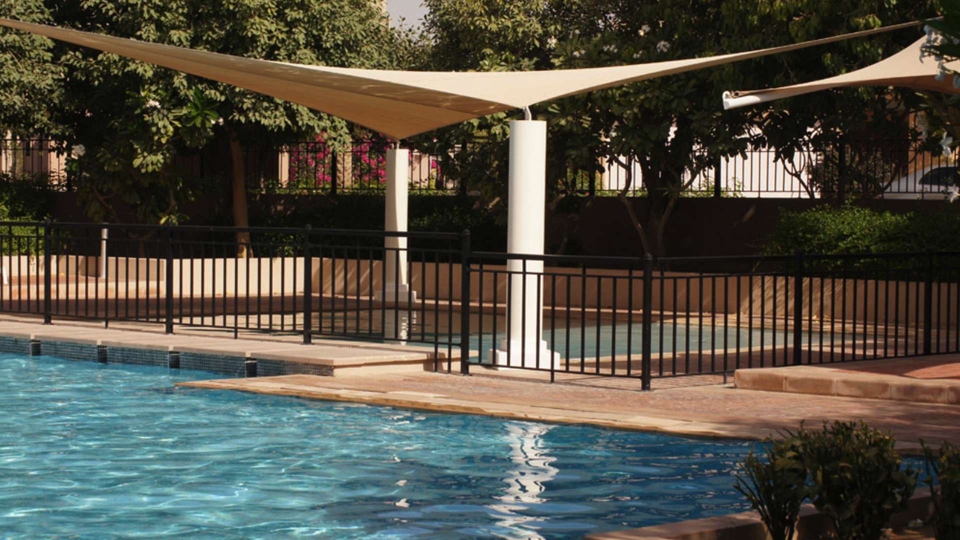 Luxury Aseel Villa pool with shade structures in Arabian Ranches, six bedrooms, seven bathrooms