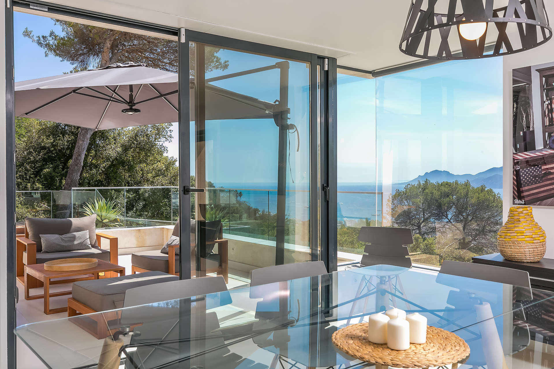 Outdoor terrace with ocean view at luxury villa, Cannes Californie, French Riviera