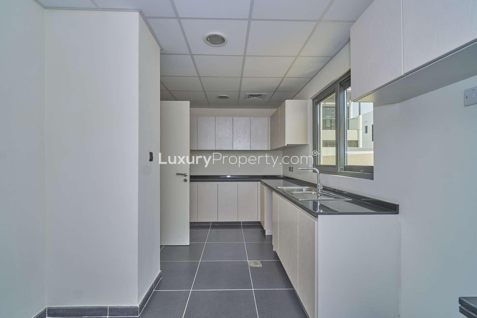 Modern kitchen in six-bedroom villa, Claret, Damac Hills 2, Akoya, for sale