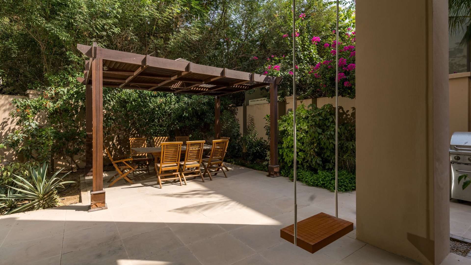 Luxurious poolside view at 6-bedroom Dahlia Villa, Al Barari, Dubai