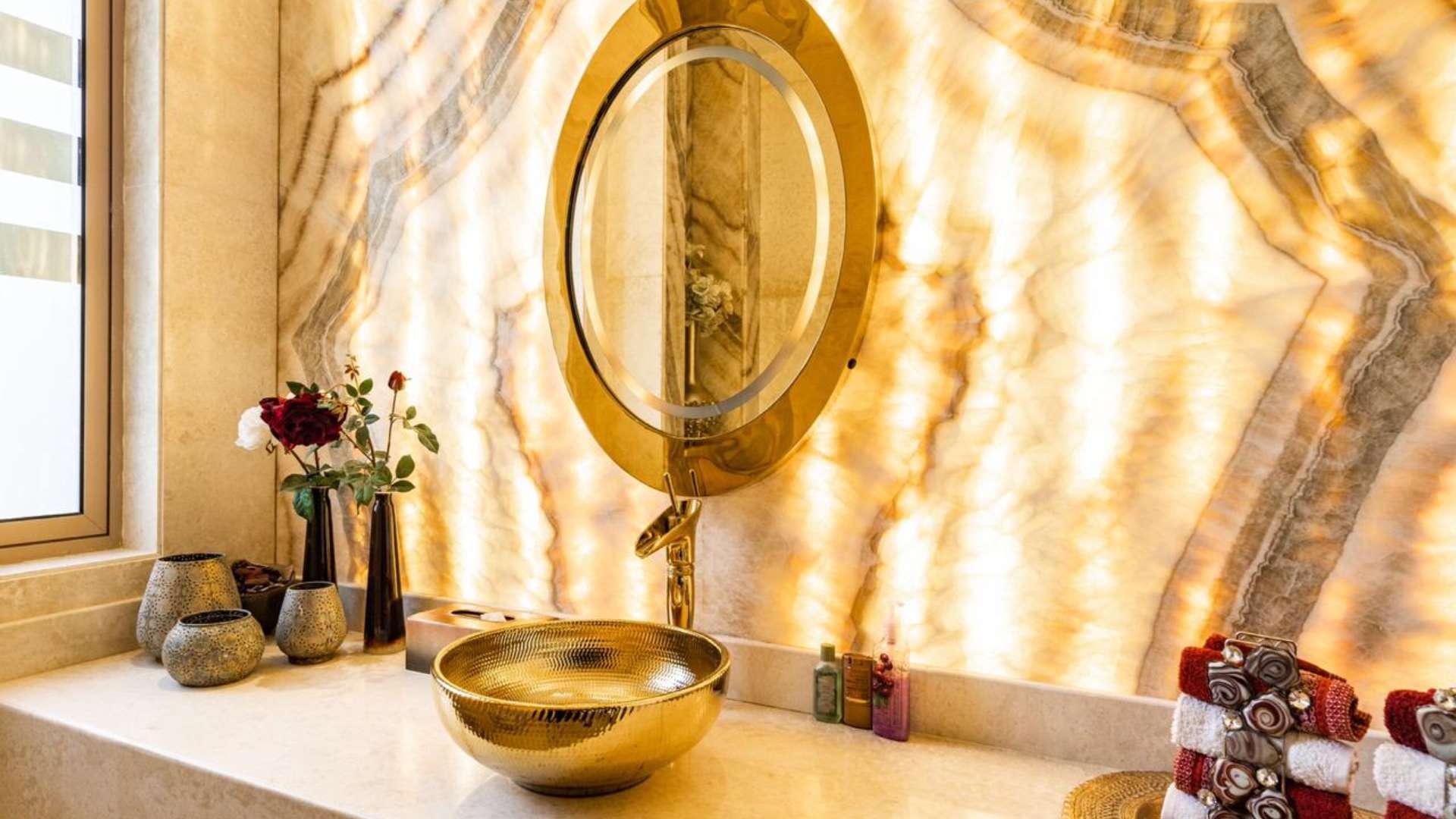 Luxurious living room in 6-bedroom villa, Desert Leaf, Al Barari, featuring elegant decor