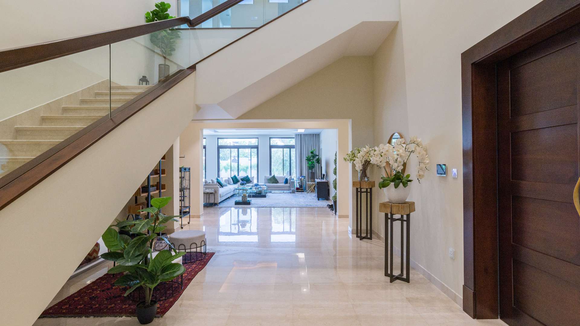 Modern kitchen and living area in 6-bedroom villa, District One, Mohammed Bin Rashid City