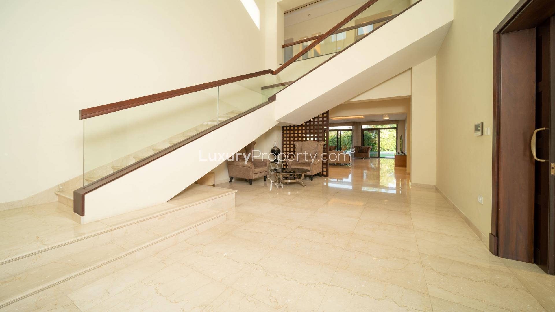 Modern Arabic villa interior with elegant staircase in District One, Mohammed Bin Rashid City