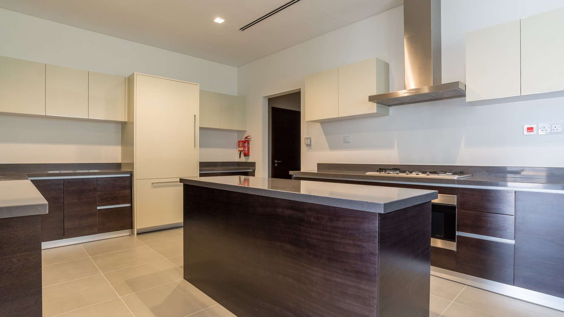 "Spacious villa interior with modern bathroom and large windows in District One, Dubai.",Luxurious bathroom in 6-bedroom villa, District One, Dubai, featuring modern fixtures and design