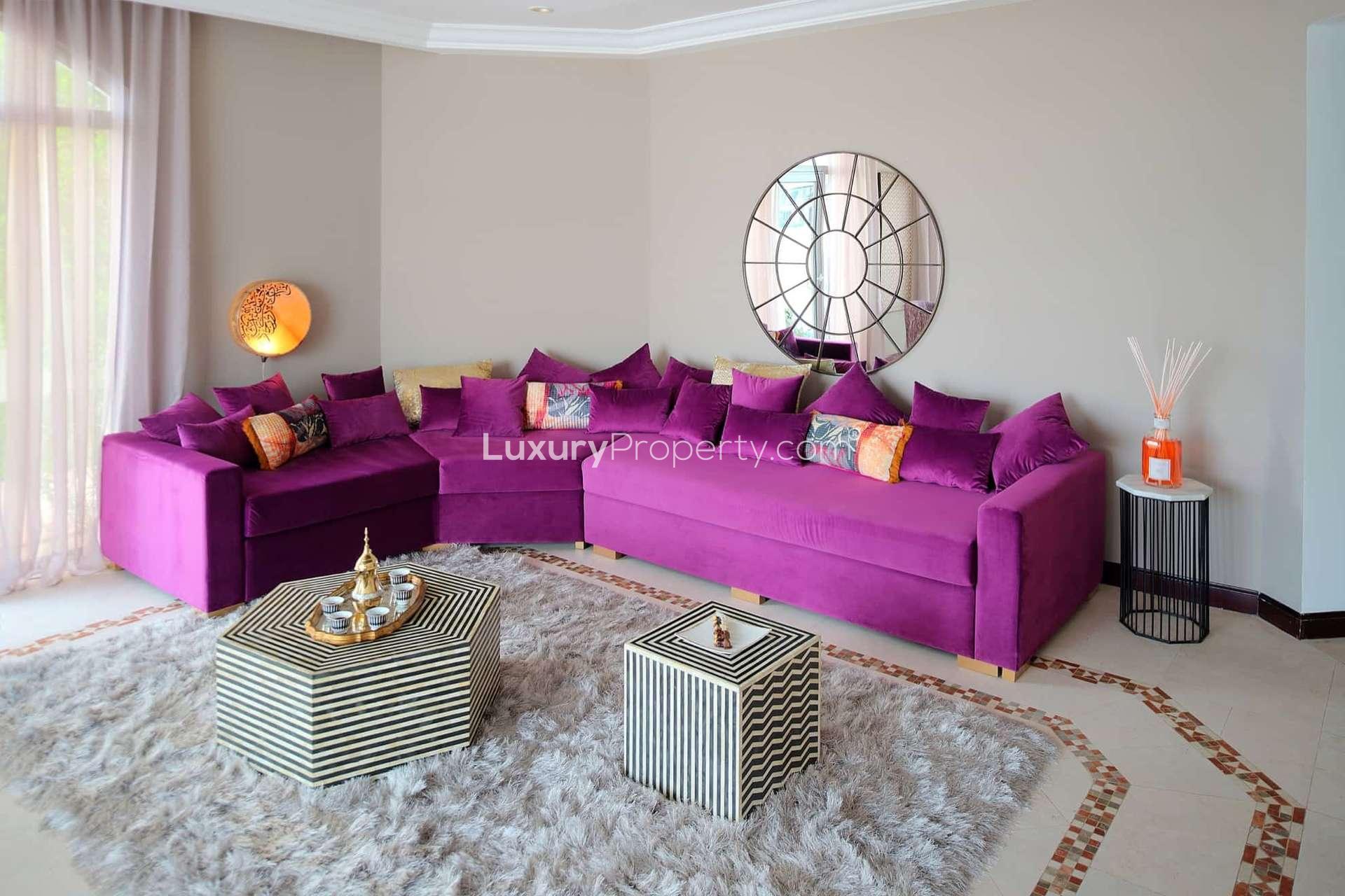 Elegant living room with waterfront view in Palm Jumeirah villa for rent