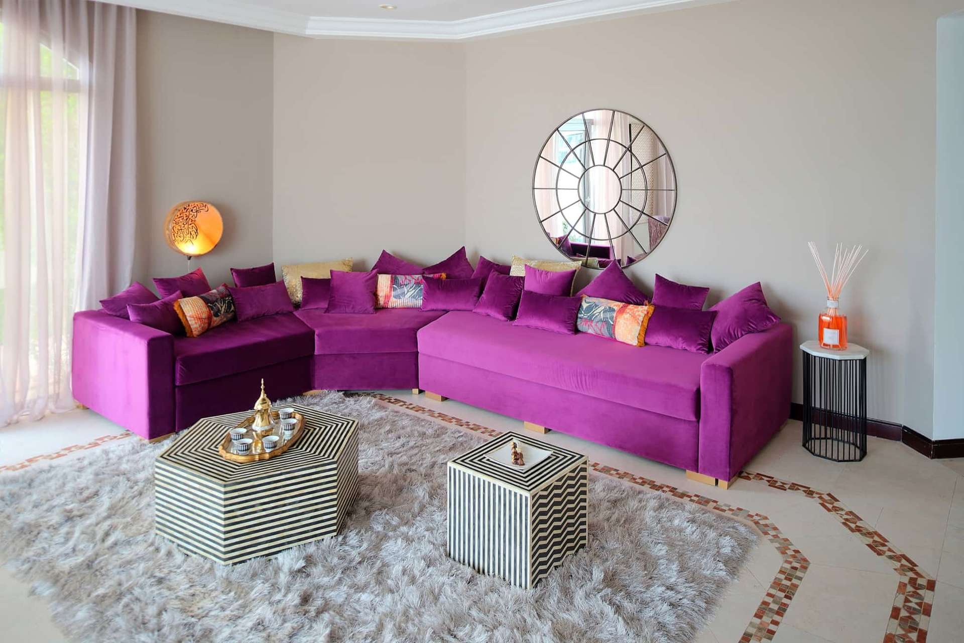 Elegant living room with waterfront view in Palm Jumeirah villa for rent