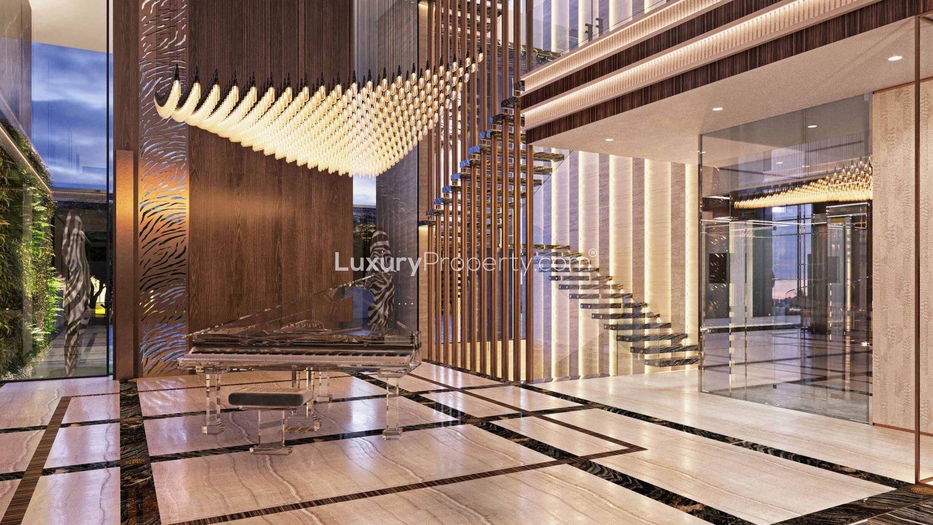 Luxurious basement lounge in stunning 6-bedroom villa, Damac Hills, featuring modern decor and pool table