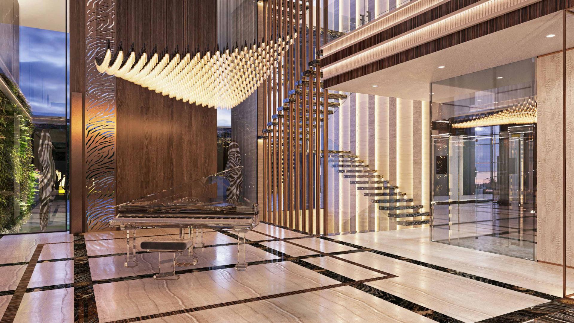 Luxurious basement lounge in stunning 6-bedroom villa, Damac Hills, featuring modern decor and pool table