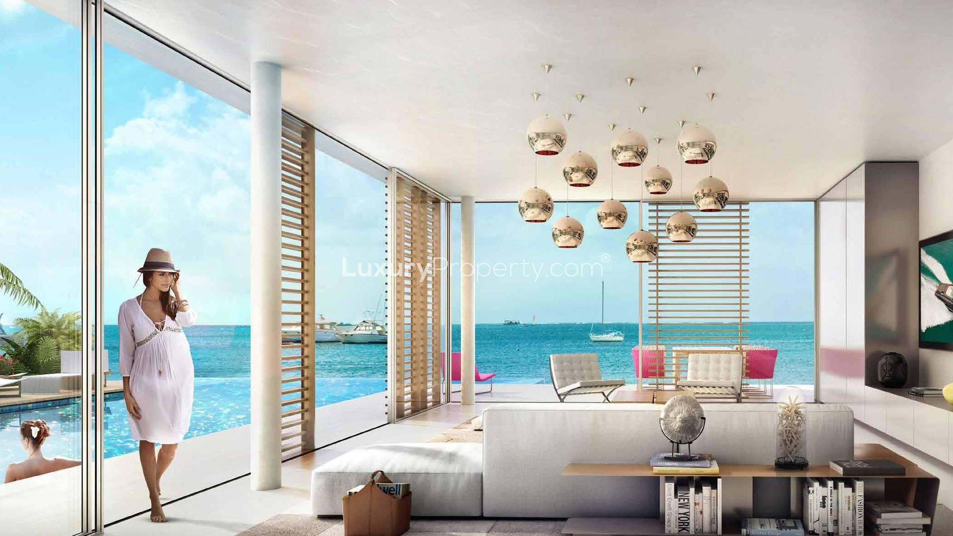 Luxurious villa terrace with city skyline view at night, Germany Island, The World Islands