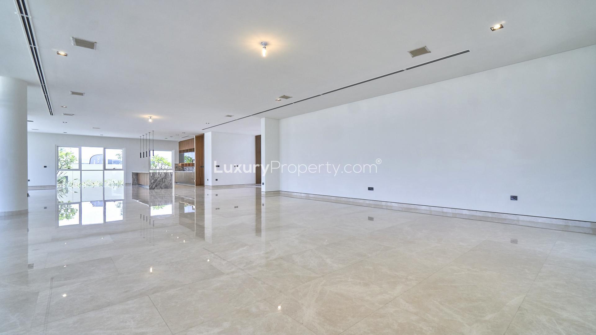 Spacious interior of brand new villa at Golf Place, Dubai Hills Estate, with large windows