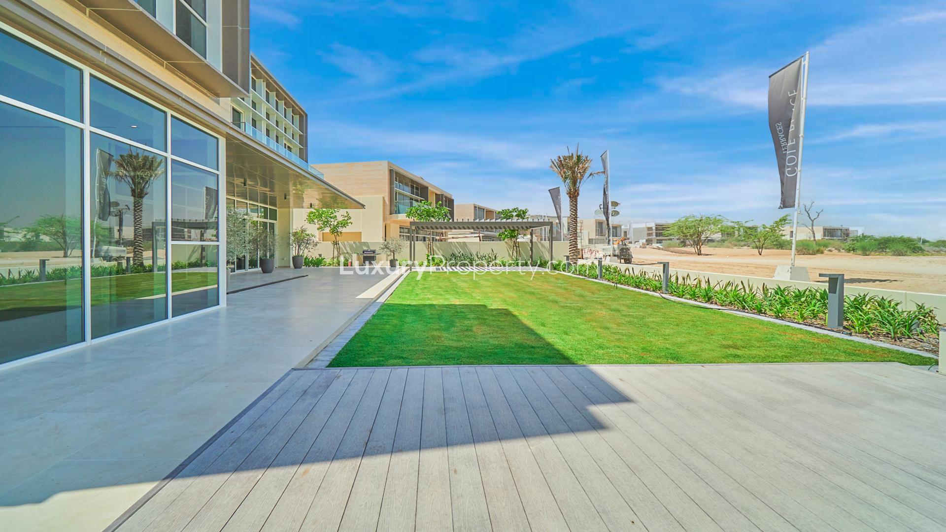 Modern villa exterior with lush garden in Dubai Hills Estate, Golf Place community