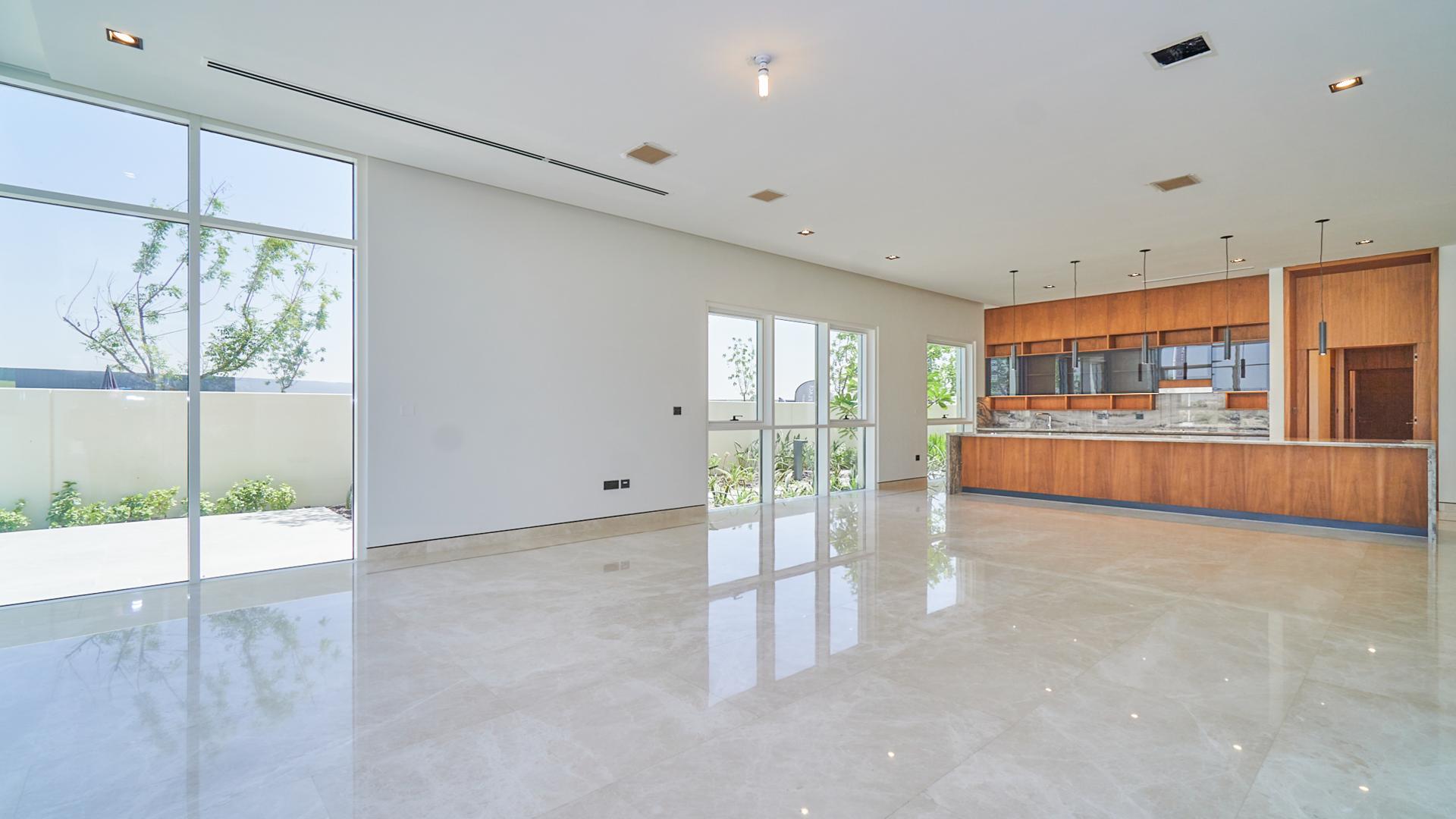 Spacious living area in Dubai Hills Estate villa with modern finishes and natural light