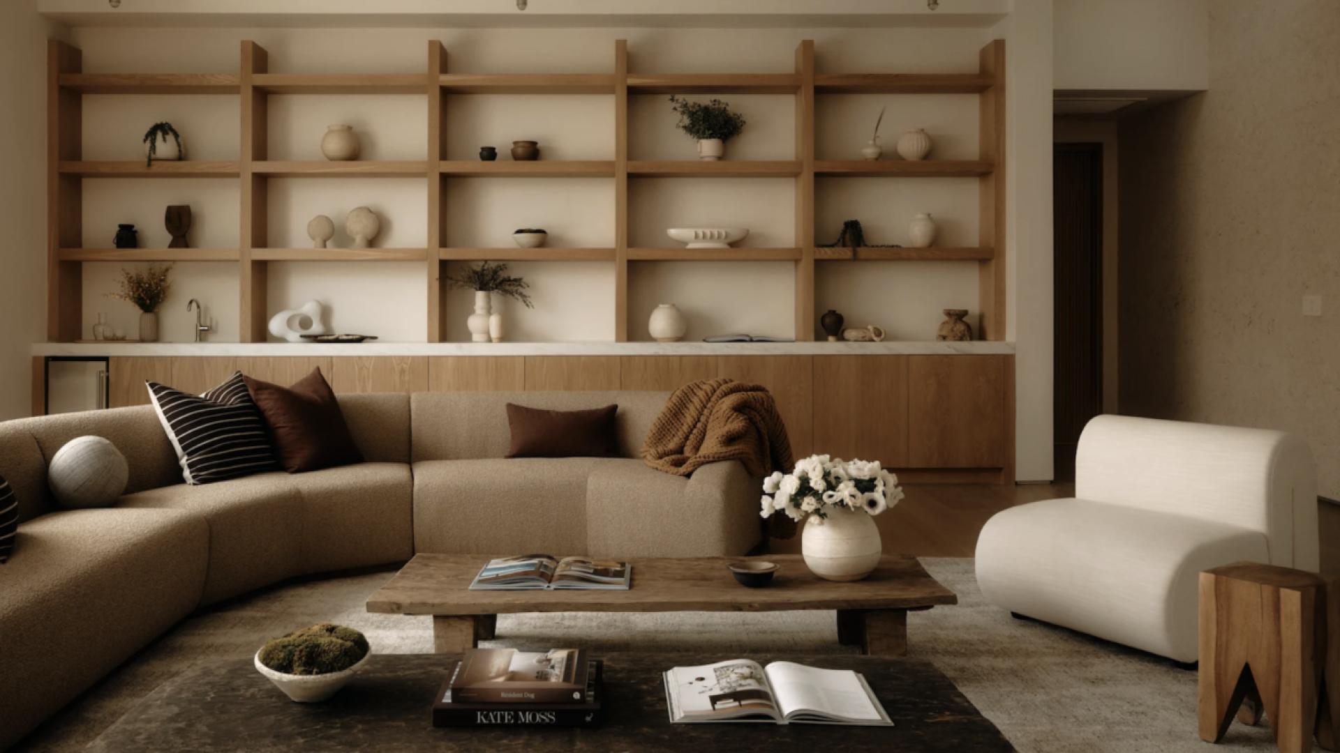 Luxurious villa entrance with glass doors and greenery in Beverly Hills, California