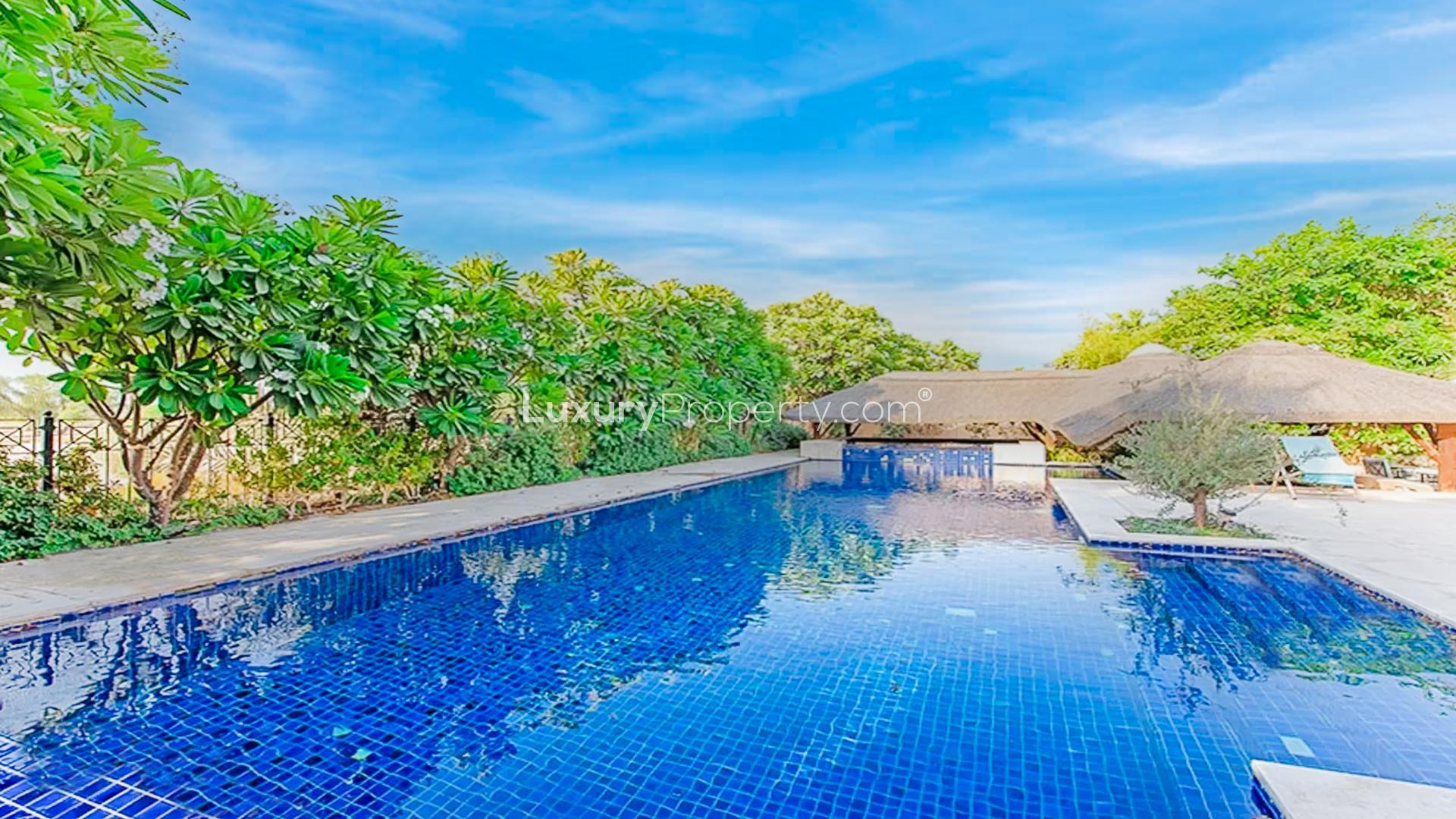 Spacious 6-bedroom villa exterior with garden in Hattan, Arabian Ranches, Dubai