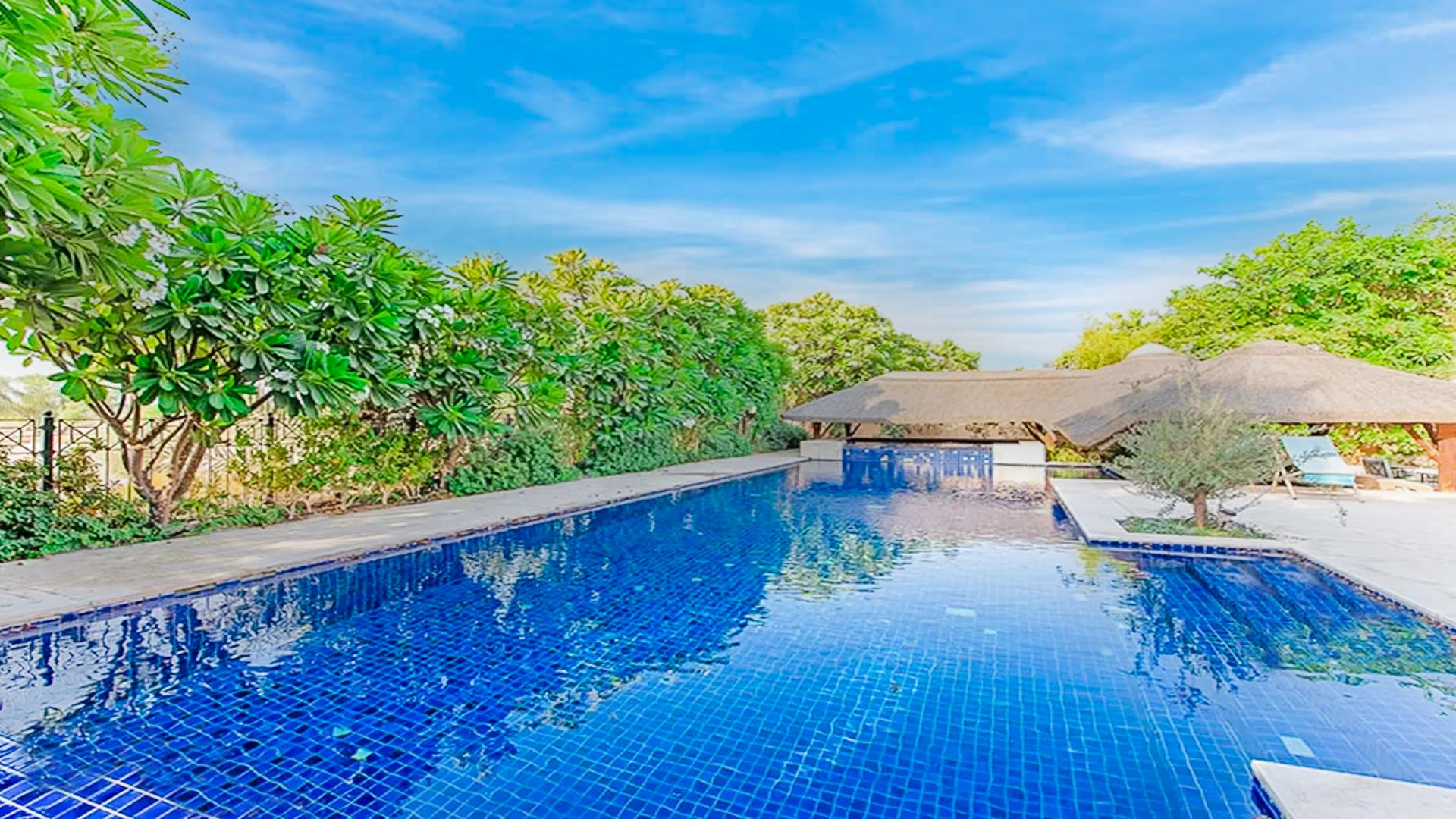 Spacious 6-bedroom villa exterior with garden in Hattan, Arabian Ranches, Dubai