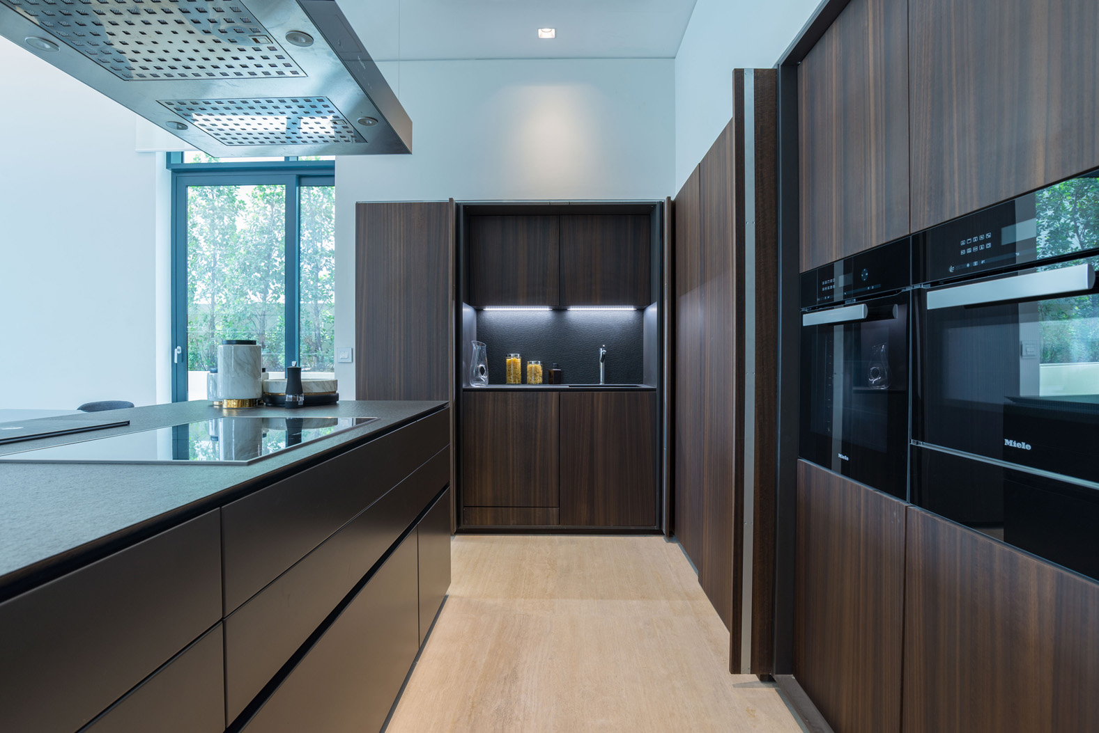 Luxurious dining area in furnished villa, Hillside, Jumeirah Golf Estates, with garden view