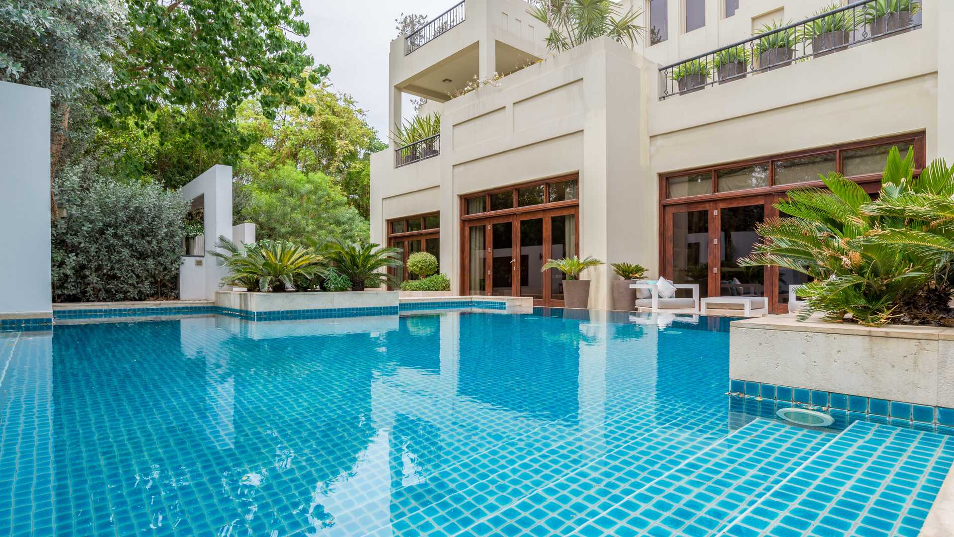 Luxurious villa foyer with elegant decor and columns in Jasmine Leaf, Al Barari