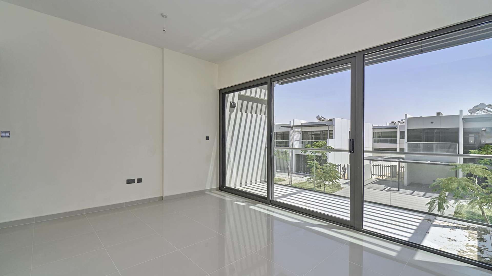 Modern exterior of 6-bed villa for sale in Juniper, Damac Hills 2, Akoya community