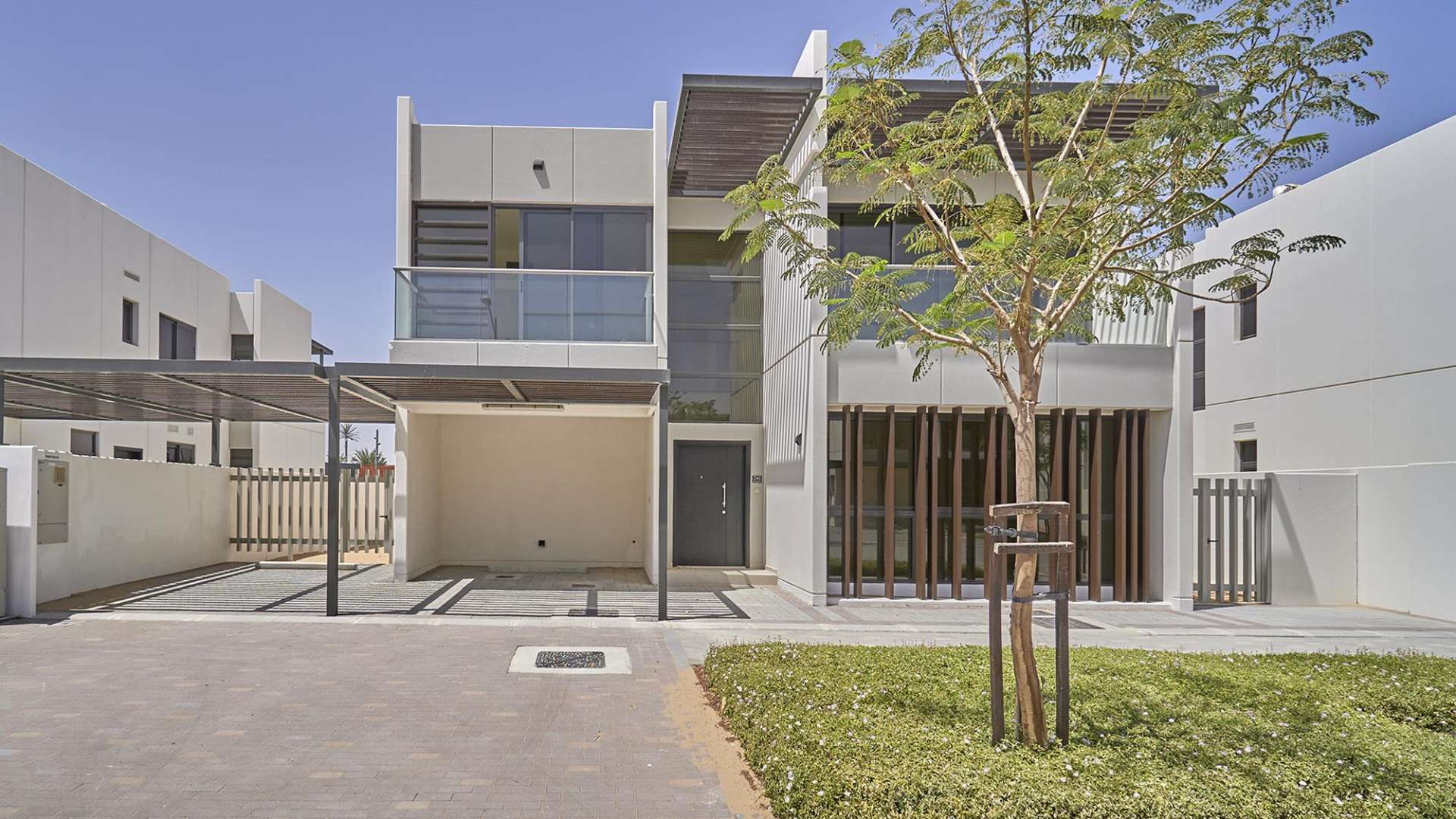 Villa exterior with pool and park view in Juniper, Damac Hills 2, Akoya community