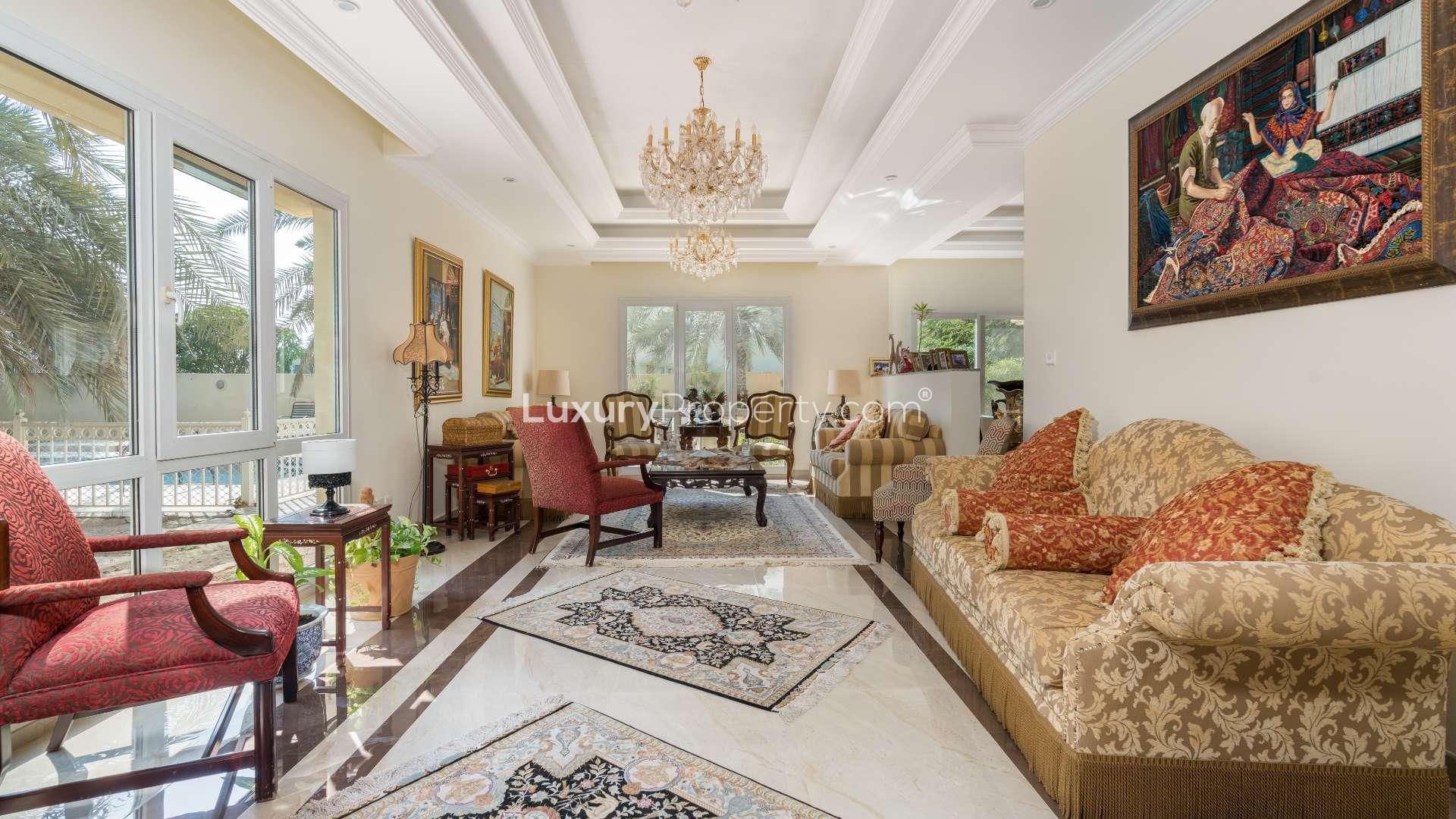 Luxury villa pool with palm trees and lake views in Meadows 9, Emirates Living