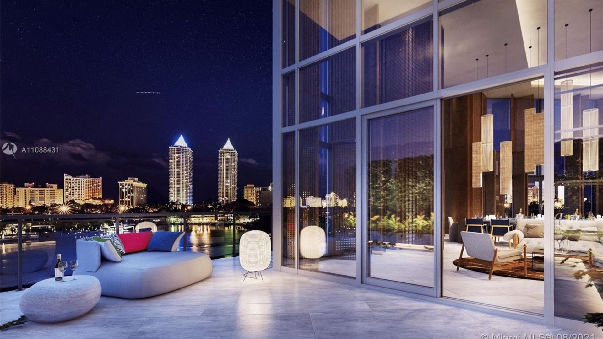 Luxury bedroom in 6-bed Miami lakehouse villa with modern design and city views