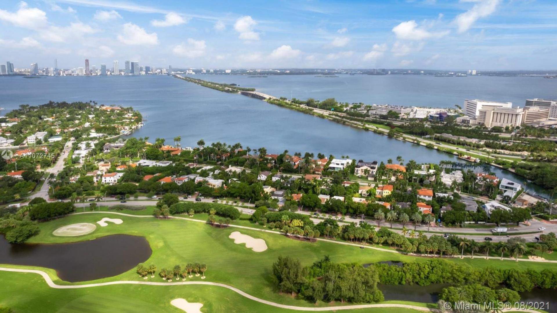 Luxury Miami villa with pool and private dock overlooking bay, for sale in Florida