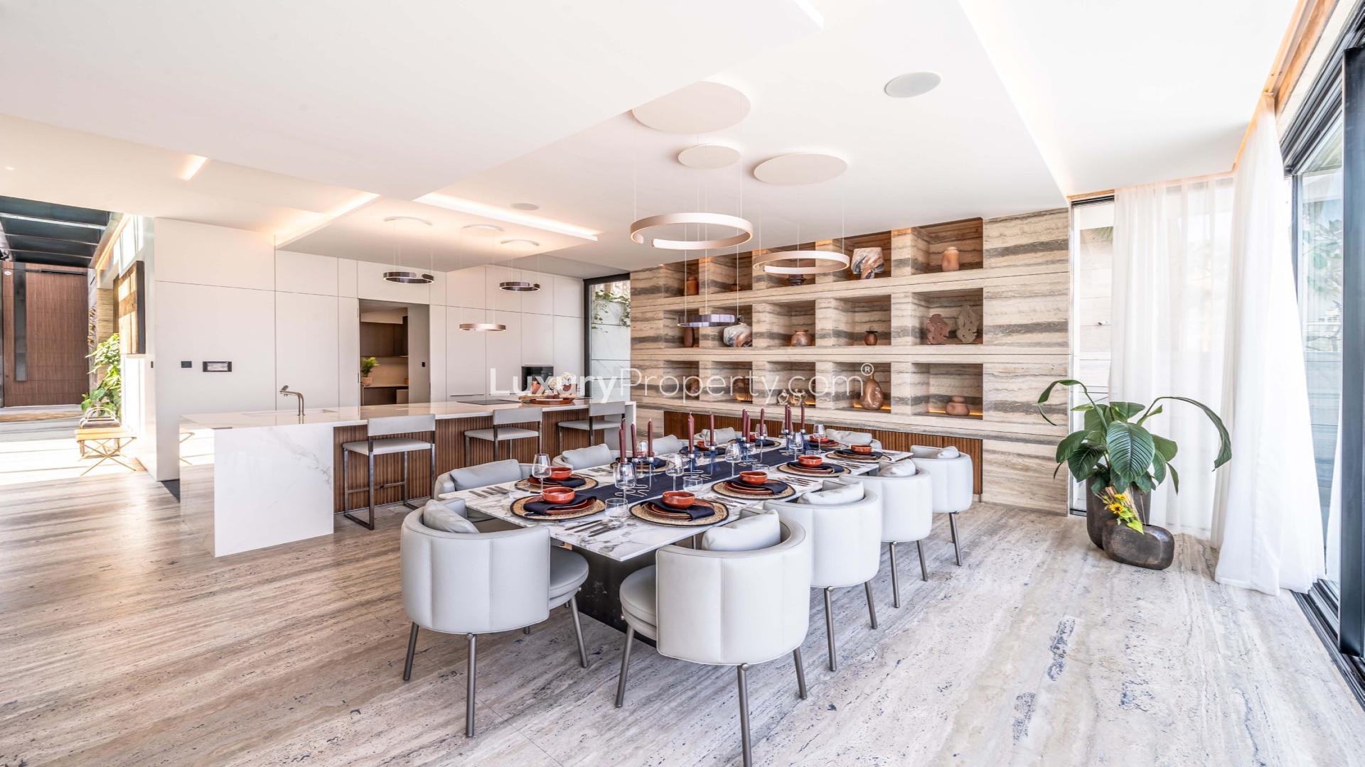 Modern six-bedroom villa exterior in Palm Jumeirah's Billionaire Frond, for sale