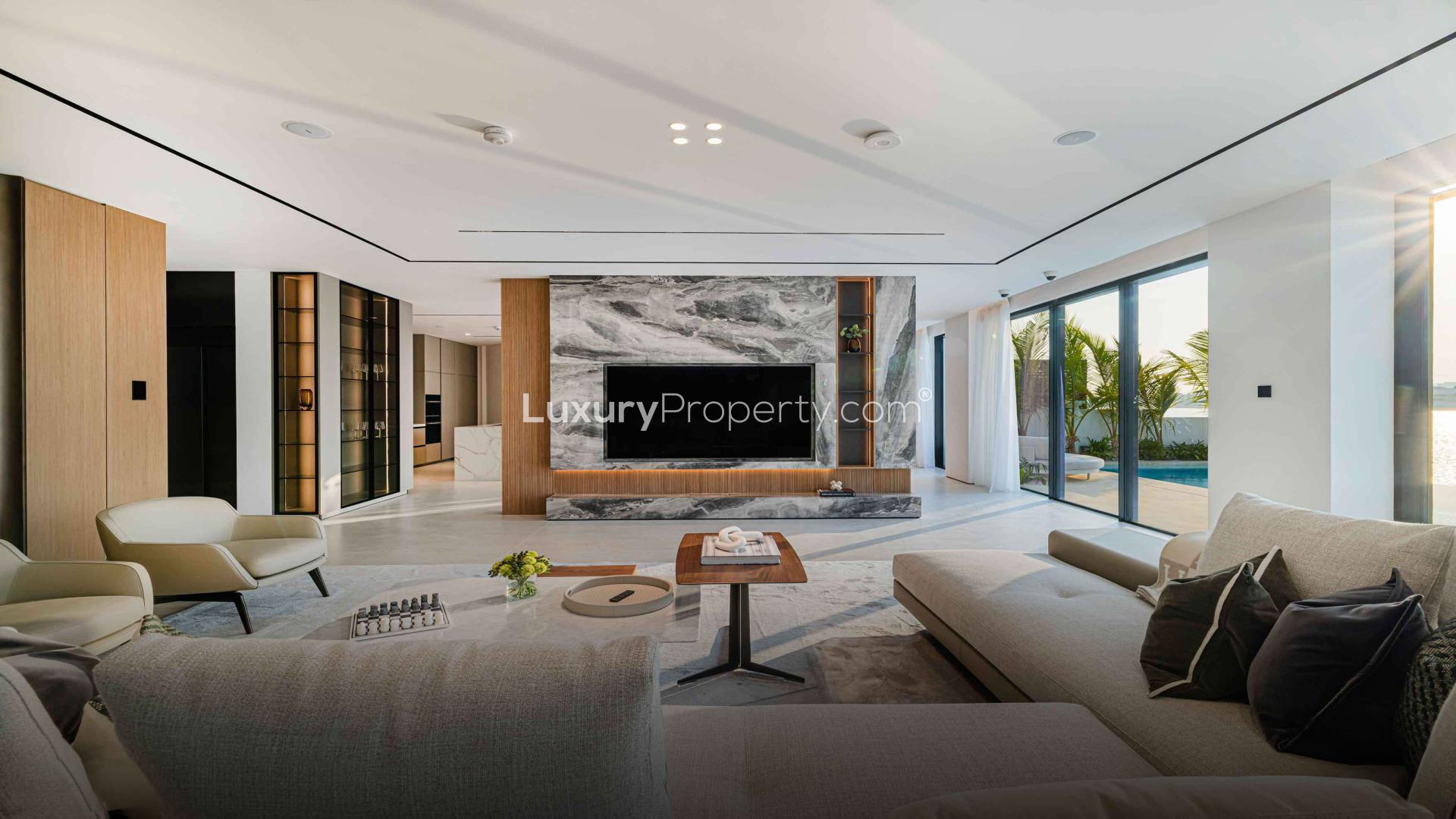 Modern three-storey villa exterior with garage in Palm Jumeirah's Garden Homes community