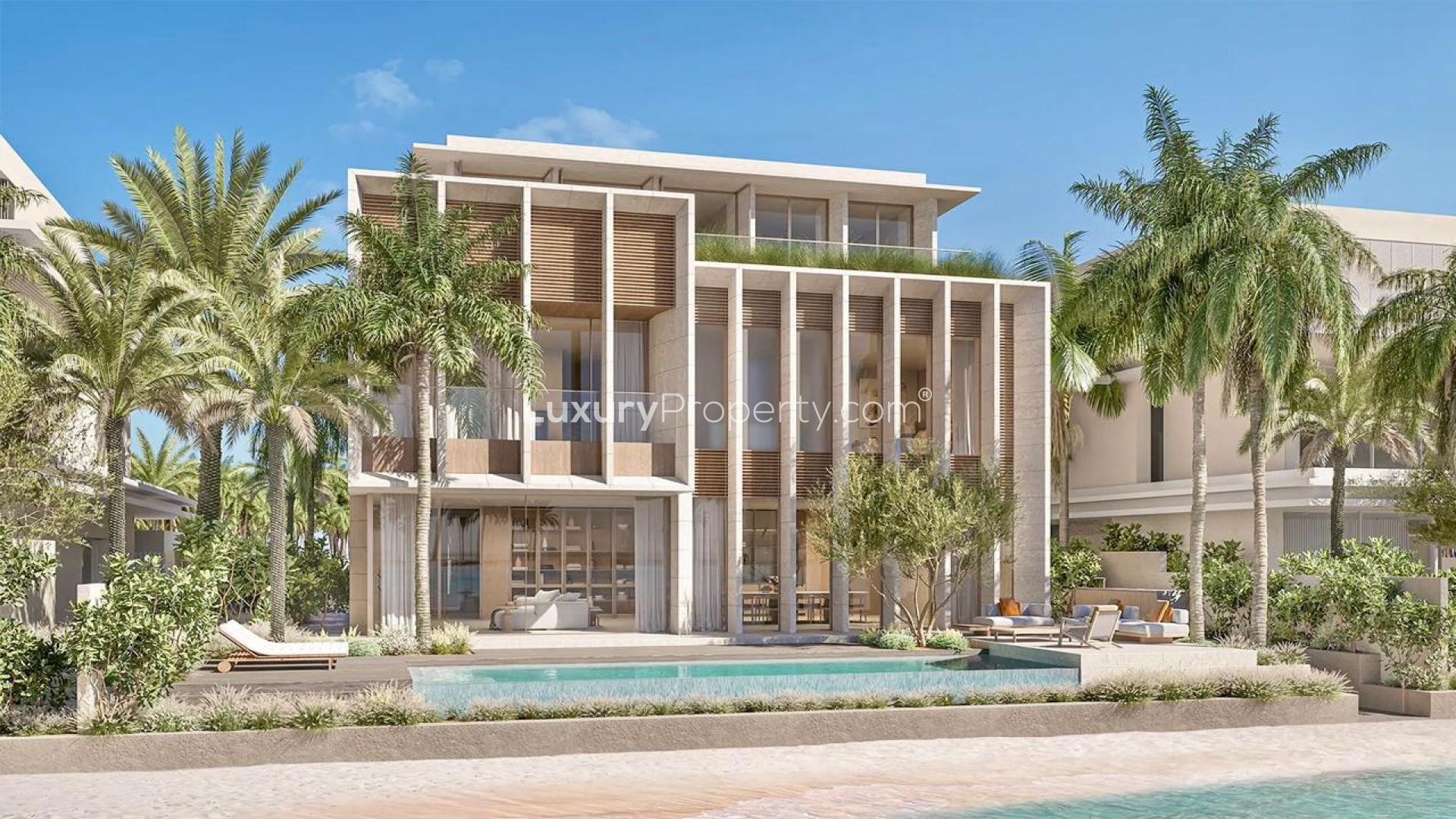 "Luxury beachfront villa with pool, modern design, Palm Jebel Ali Frond M, for sale.",Modern tropical villa with pool, surrounded by palm trees on Palm Jebel Ali Frond M