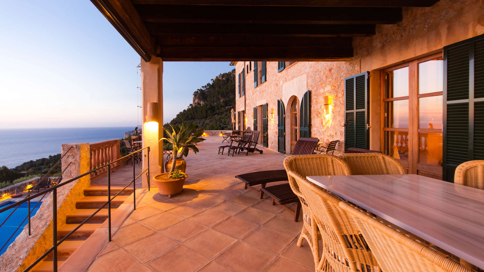 Luxurious living room in Mallorca villa with wooden beams and elegant furnishings