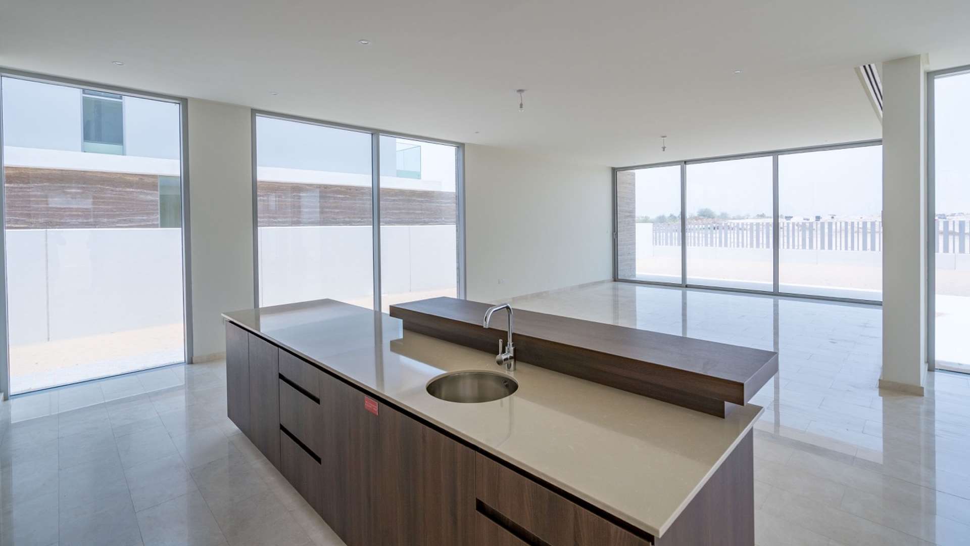 Empty room with large window in Dubai Hills Estate villa, Parkway Vistas