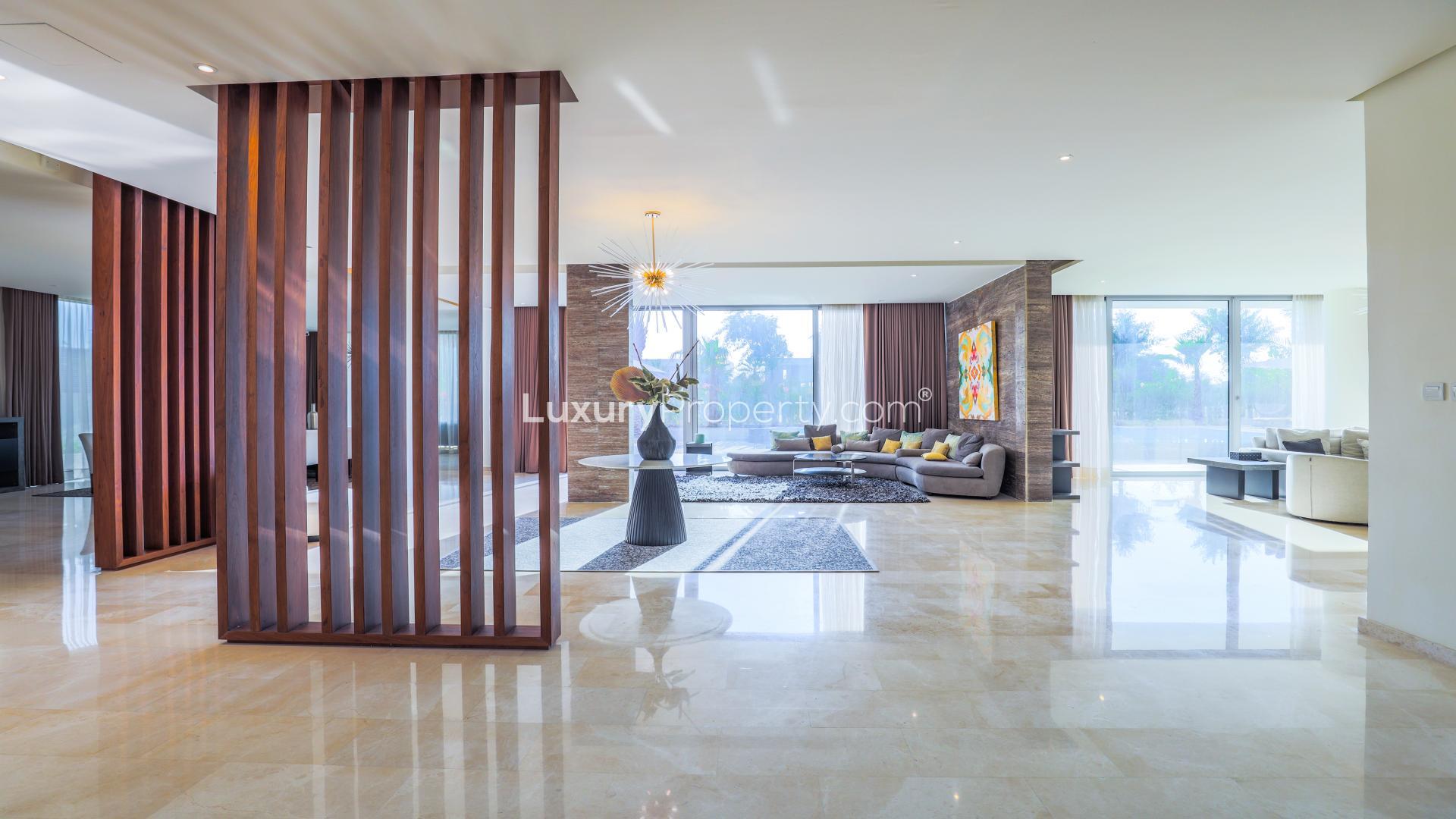 Luxurious living room with large windows in Dubai Hills Estate villa, Parkway Vistas