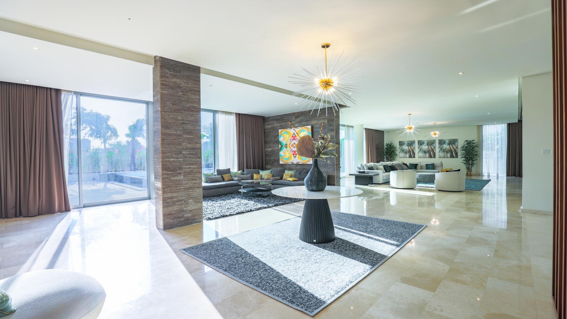 Luxurious living room in 6-bed villa, Dubai Hills Estate, elegant decor and spacious layout