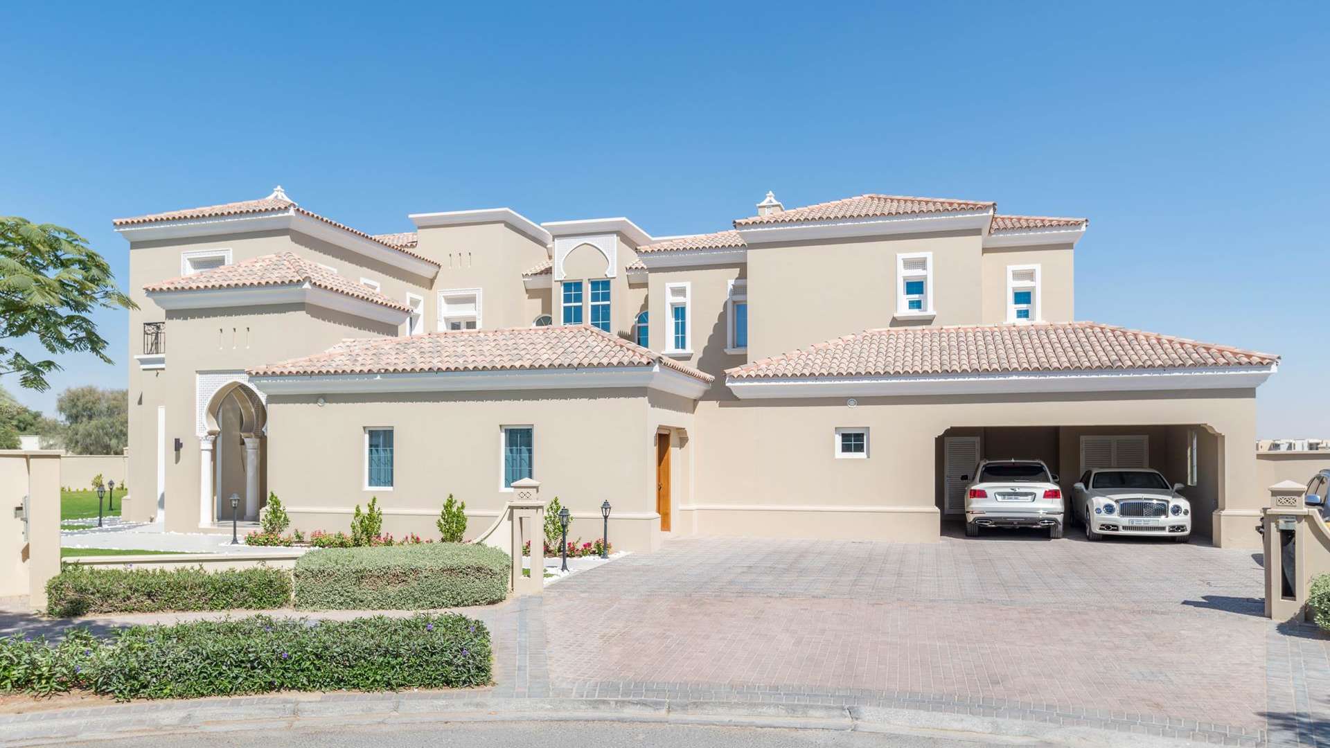 Luxurious villa patio with pool view in Polo Homes, Arabian Ranches