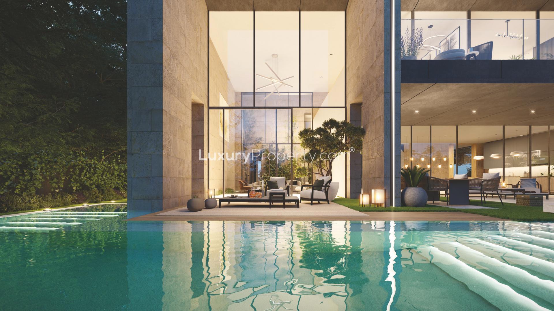 Luxurious villa exterior with poolside view in Serenity Mansions, Tilal Al Ghaf