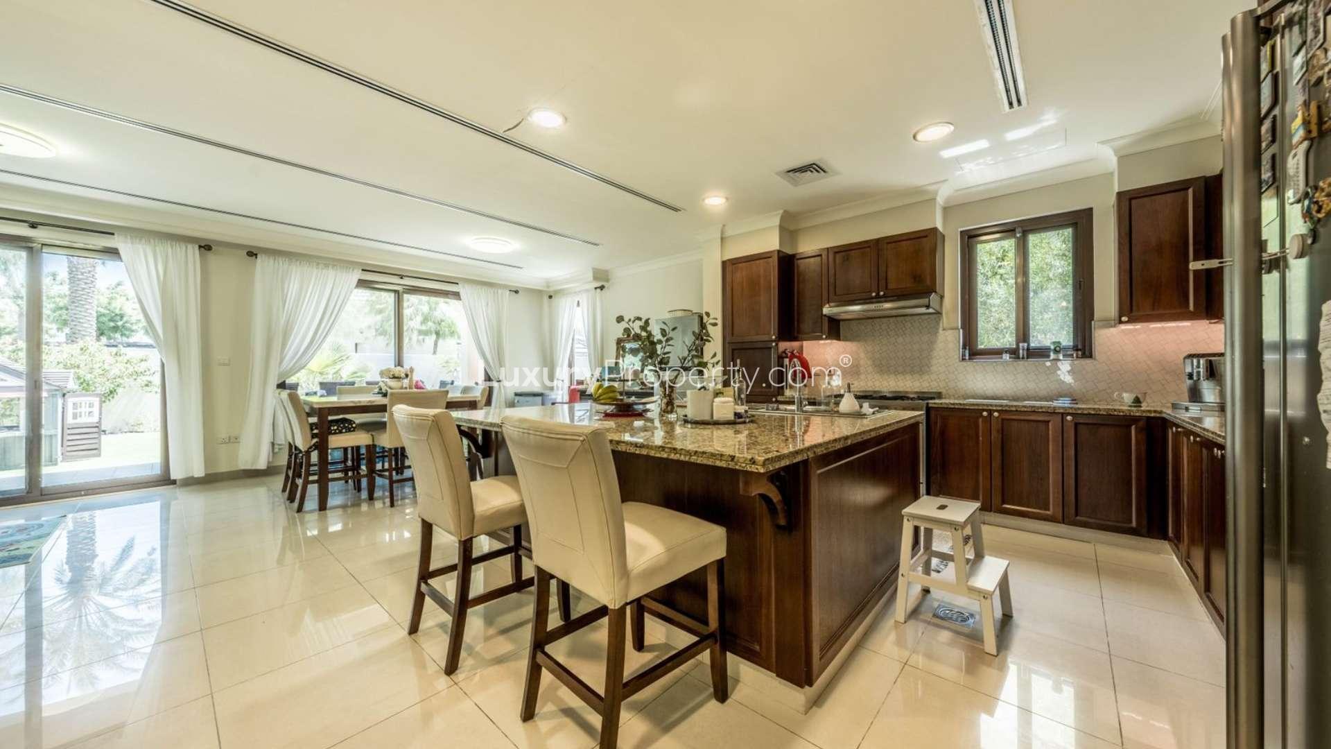 Elegant living room in Rosa villa, Arabian Ranches 2, with garden view and natural light