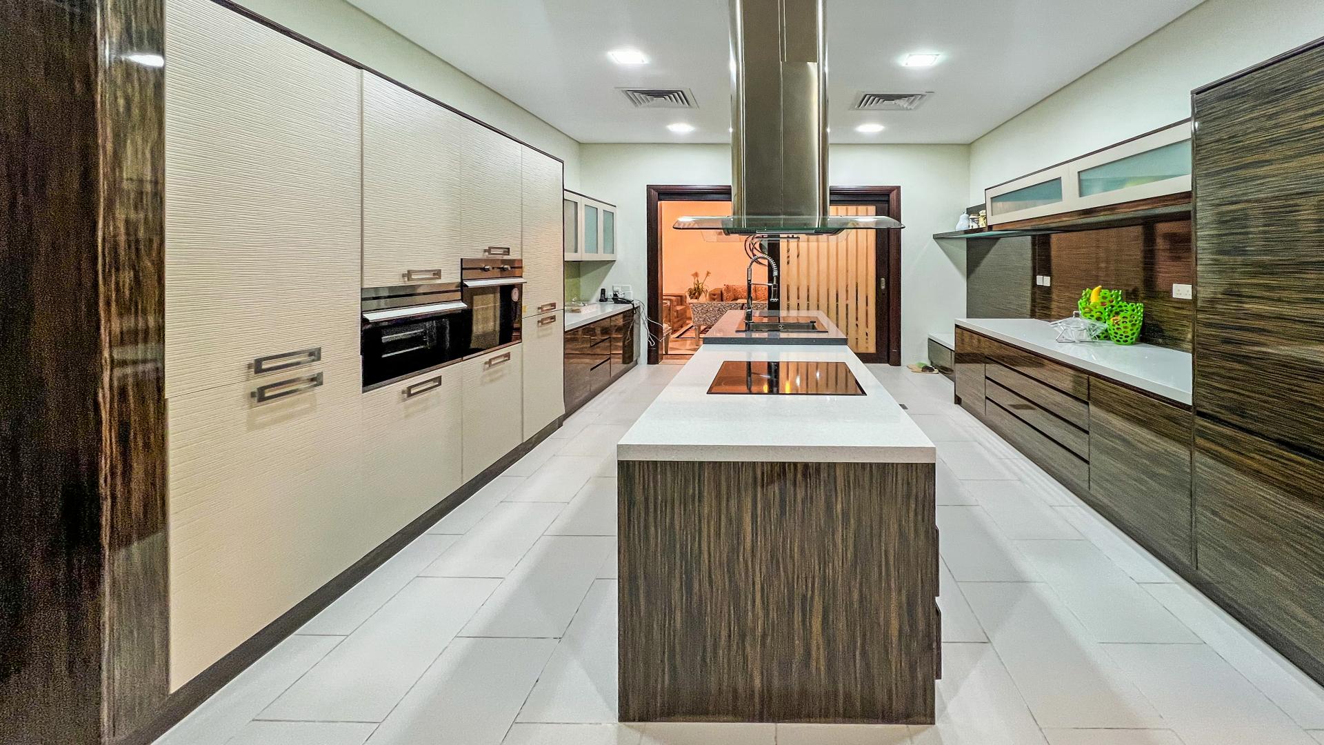 Elegant dining room in luxurious 6-bedroom villa, Emirates Hills, Sector E, for sale