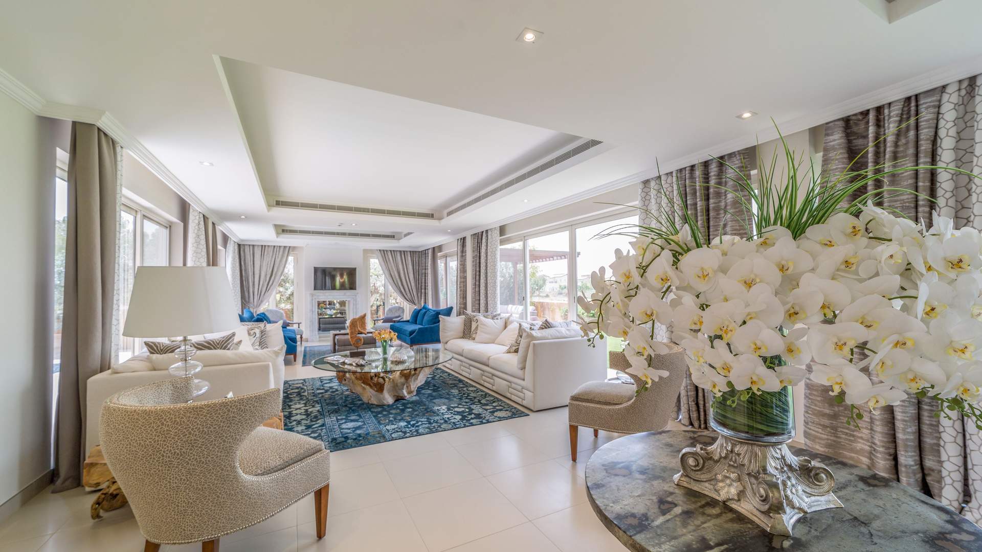 Bright hallway with large windows and pool view in Sienna Views villa, Jumeirah Golf Estates