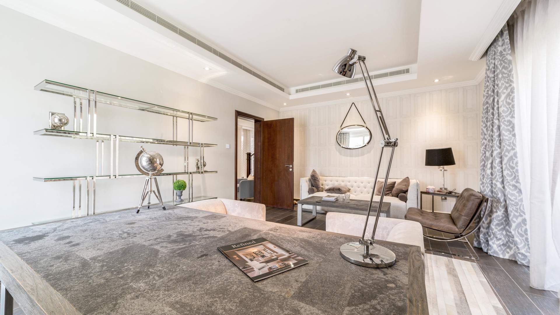 Luxurious bedroom in Sienna Views villa, Jumeirah Golf Estates, with garden view and elegant decor