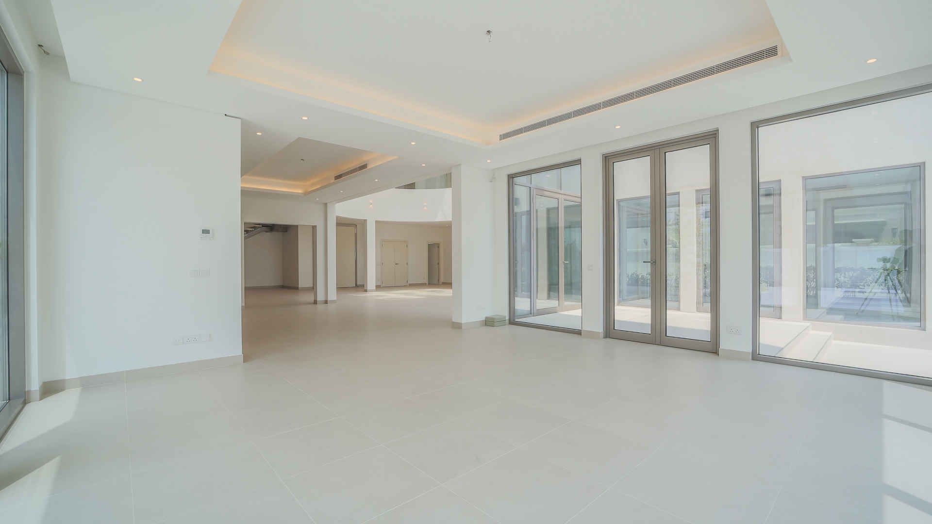Spacious living room with marina skyline views in Palm Jumeirah Signature Villa for rent