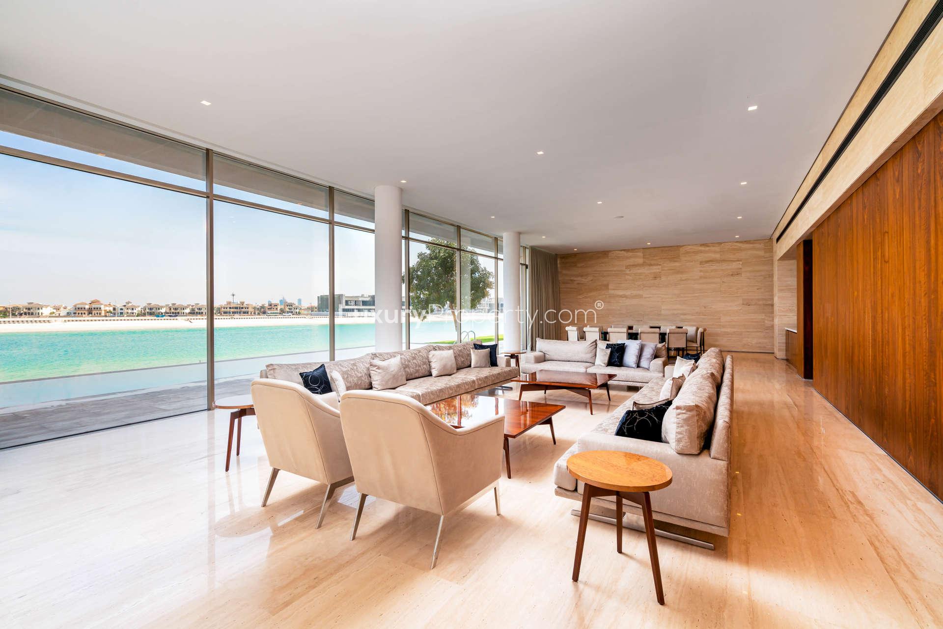 Luxurious beachfront villa living room with ocean view on Palm Jumeirah, Frond H