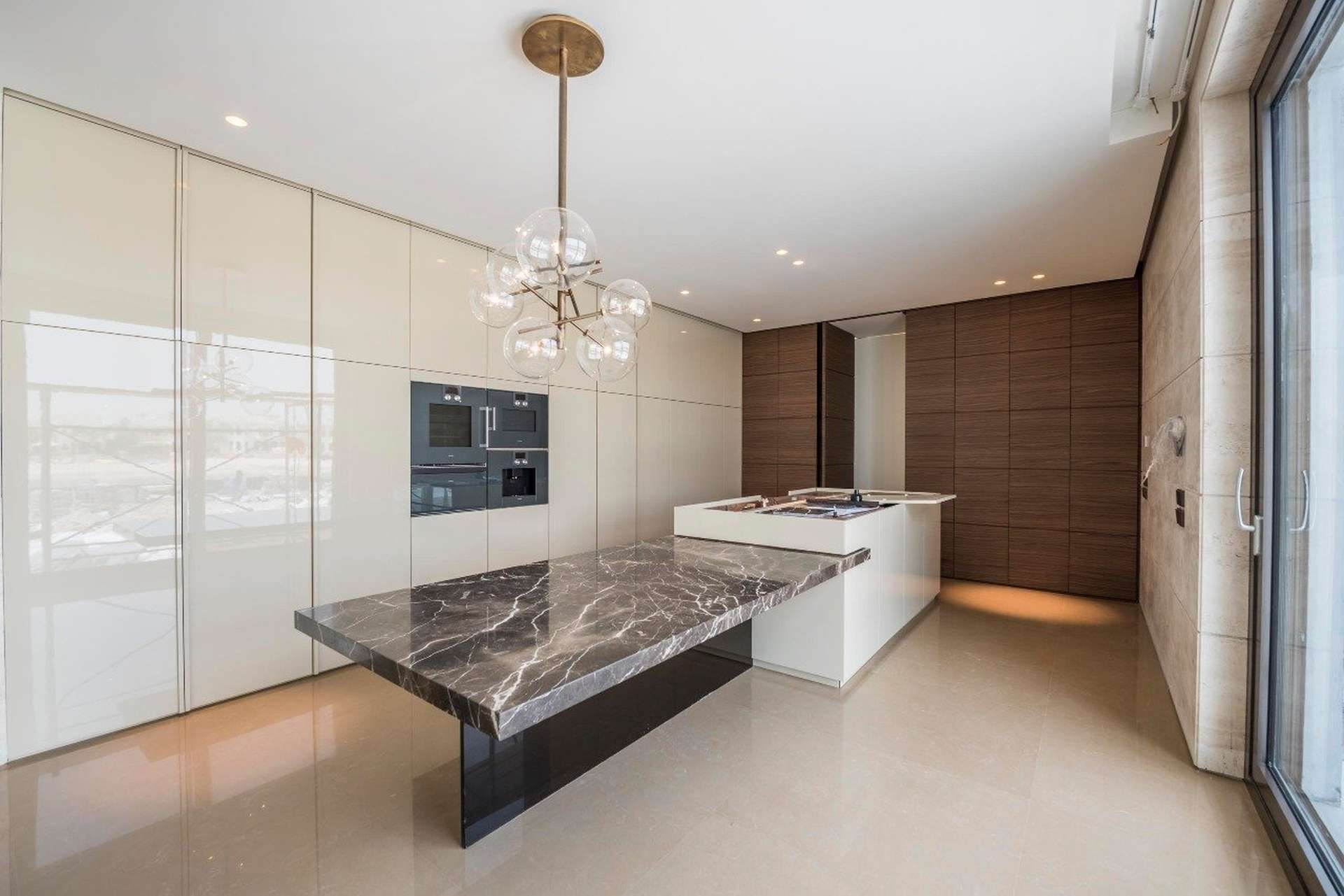 Luxurious interior of six-bedroom Palm Jumeirah Signature Villa with spacious open-plan layout