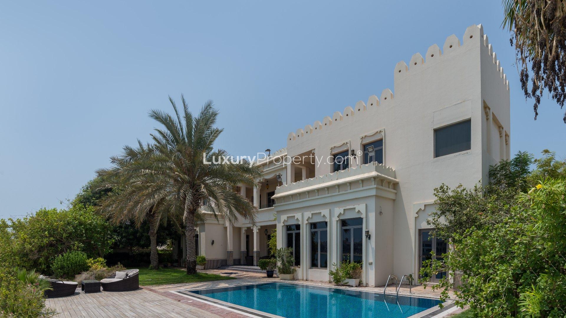 Luxurious living room in Palm Jumeirah Signature Villa for sale, elegant decor and furnishings